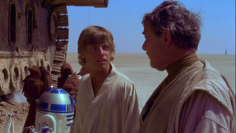 Mark Hamill looking at Phil Brown in Star Wars: A New Hope