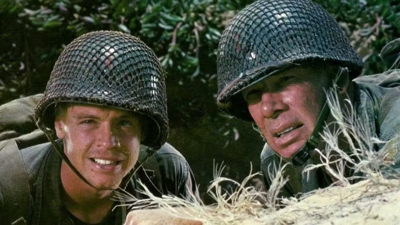 Private Griff and Sergeant lying down on the grass in The Big Red One