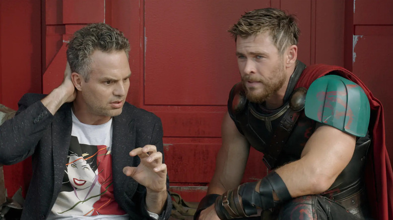 A shocked Bruce Banner (Mark Ruffalo) sits next to Thor (Chris Hemsworth) in Thor: Ragnarok