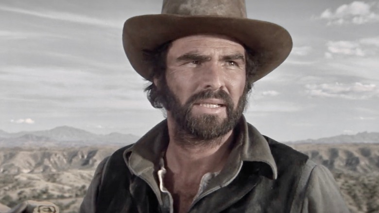 Jay Grobart wearing a cowboy hat in The Man Who Loved Cat Dancing