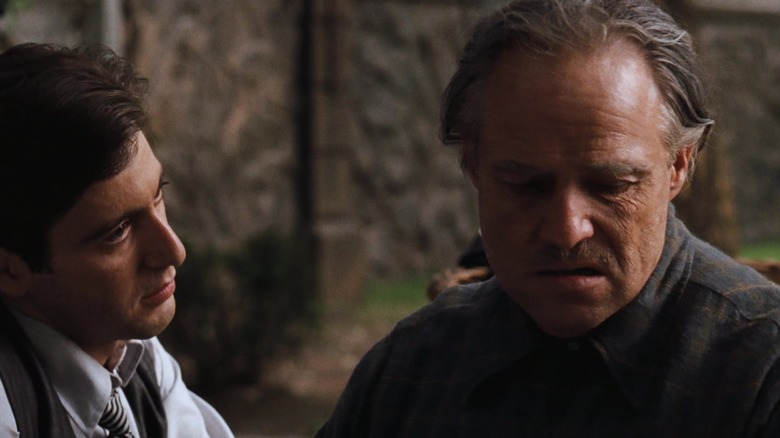 Michael and Vito Corleone talking outside in The Godfather