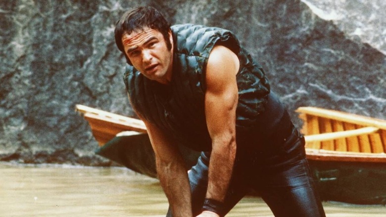 Burt Reynolds braves a roaring river as Lewis Medlock in Deliverance