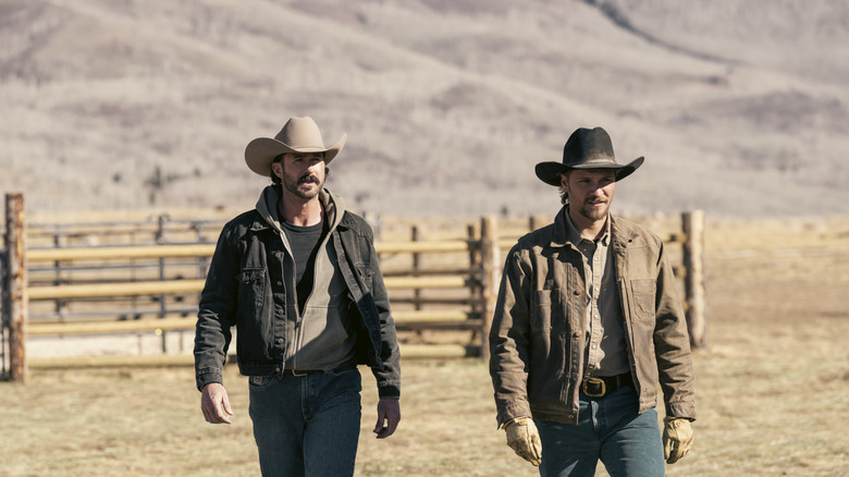 Garrett (Riley Green) and Kayce Dutton (Luke Grimes) walking together on "Marshals."