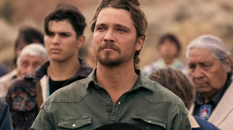 Kayce Dutton holds his hat over his heart during a remembrance ceremony in Marshals