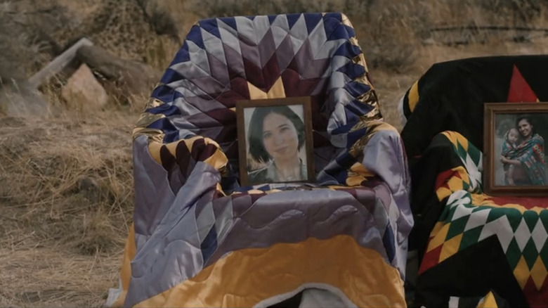 A photo laid at a grave site shows Kelsey Asbille's Monica Dutton in Marshals