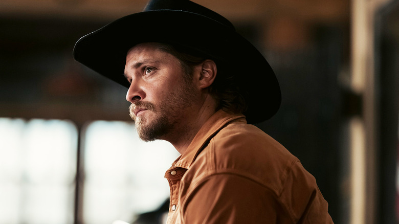 Luke Grimes' Kayce Dutton looks up as he sits in his cabin in Marshals