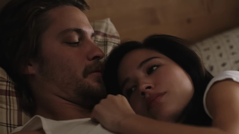 Kelsey Asbille's Monica Dutton lays her head on the chest of Luke Grimes' Kayce Dutton in Yellowstone