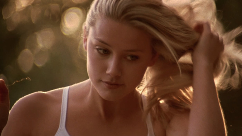 Amber Heard's Mandy Lane is seen playing with her hair in All the Boys Love Mandy Lane