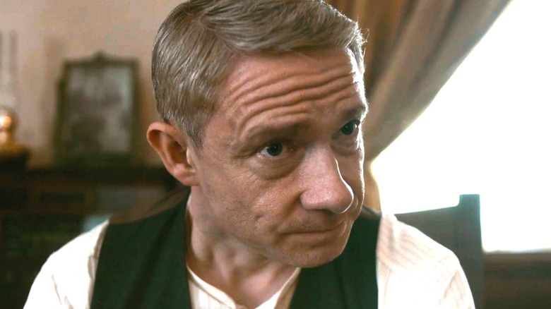 Martin Freeman's Malcolm is seen in closeup as he sits in his living room in Queen of Bones