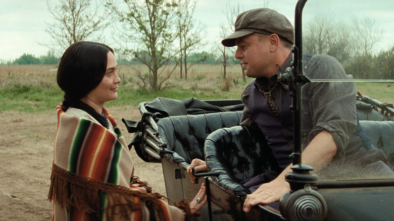 Mollie and Ernest make eyes at each other in Killers of the Flower Moon