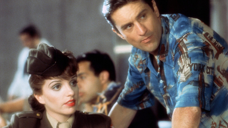 Francine seated with Jimmy leaning over her in New York, New York