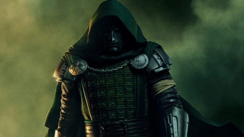 Robert Downey, Jr. as Doctor Doom wearing his armor and hood on the poster for Avengers: Doomsday