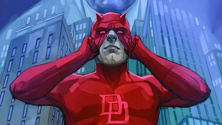 Daredevil putting on his mask