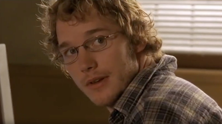 Chris Pratt as Nathan sitting in front of a computer in Path of Destruction