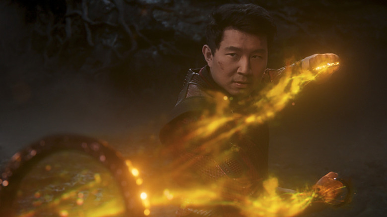 Shang-Chi (Simu Liu) wielding the Ten Rings in Shang-Chi and the Legend of the Ten Rings