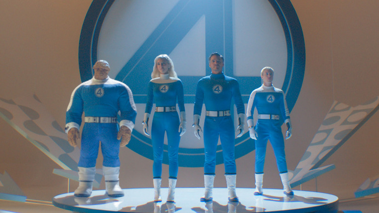 The Fantastic Four (Ebon Moss-Bachrach, Vanessa Kirby, Pedro Pascal, and Joseph Quinn) stand in a promotional interview from The Fantastic Four: First Steps