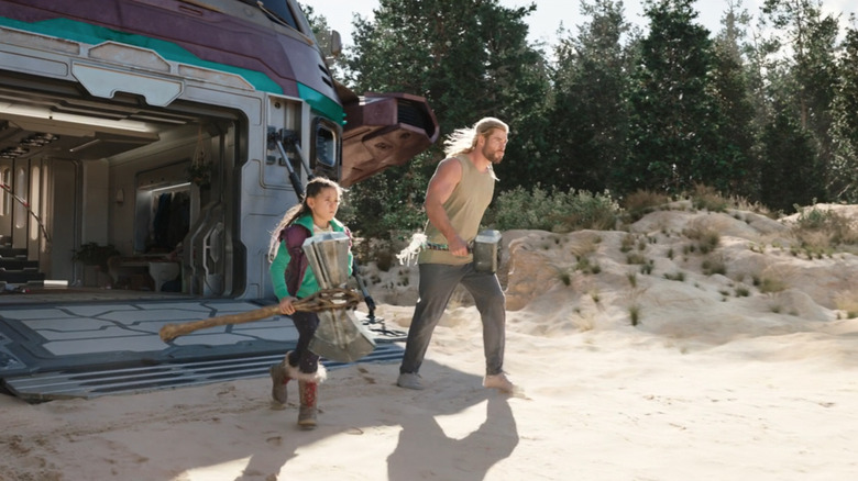 Thor (Chris Hemsworth) and Love (India Rose Hemsworth) running to battle in Thor: Love and Thunder