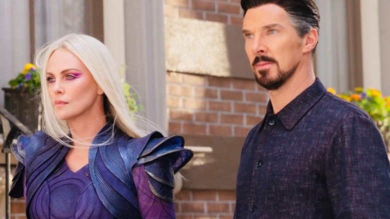 Clea and Strange walking on sidewalk