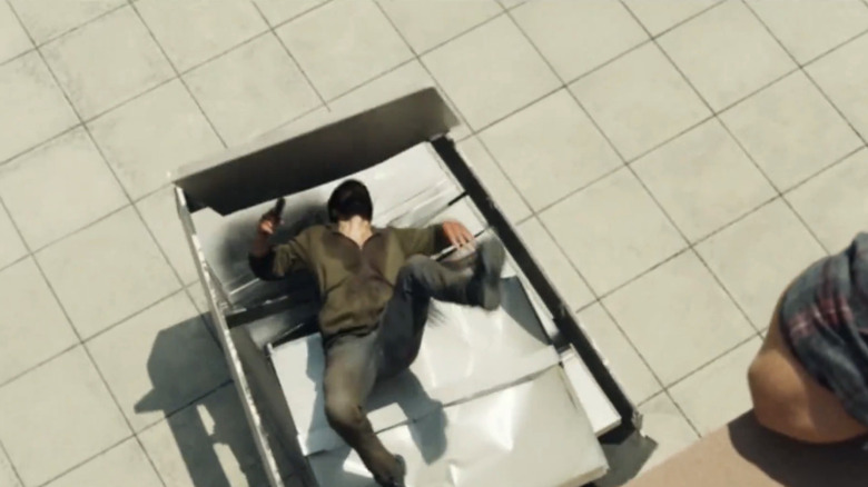 Frank Castle turns into a cartoon as he falls off a roof in The Punisher: One Last Kill