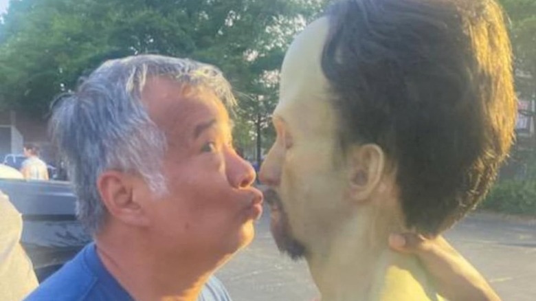A personal photo of Shutchia Tym Buacharern kissing a rubber Leader head, behind the scenes on the set of Captain America: Brave New World