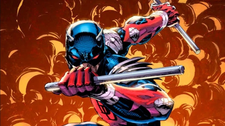 Daredevil #20 Philip Tan cover showing Daredevil in black costume surrounded by fire