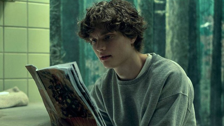 Sam Riordan reading comic in Gen V