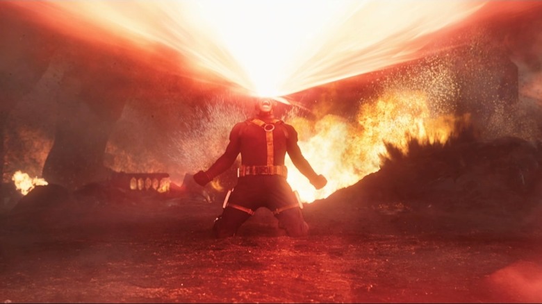 James Marsden as Cyclops emitting an energy blast through his eyes on a battlefield in Avengers: Doomsday