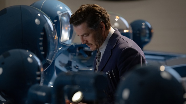 Pedro Pascal as Reed Richards with his head down at his computer console in The Fantastic Four: First Steps