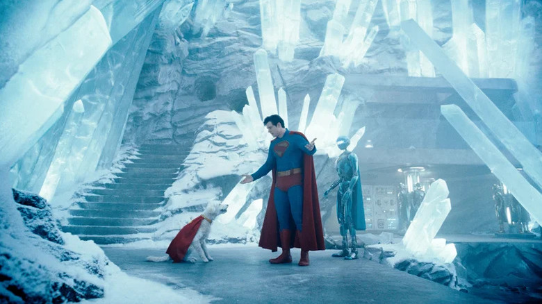 David Corenswet as Superman stands in the Fortress of Solitude talking to Krypto in Superman