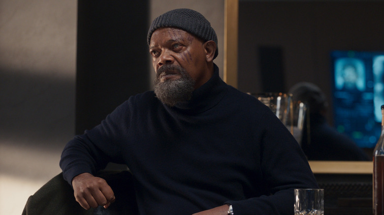 Samuel L. Jackson as Nick Fury sitting down in Secret Invasion