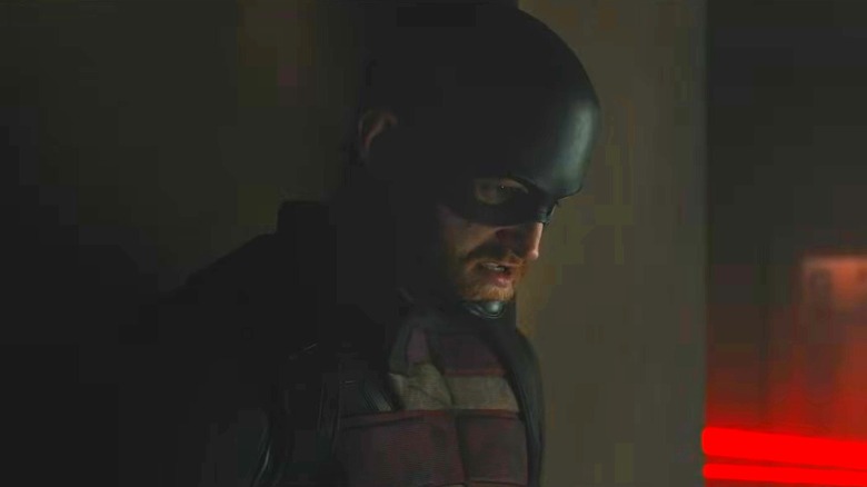 John Walker hiding behind a wall in Marvel's Thunderbolts*
