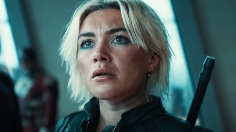 Florence Pugh as Yelena Belova looks tired and worried in closeup in Thunderbolts