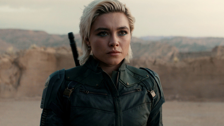Yelena Belova (Florence Pugh) standing in the desert in Thunderbolts