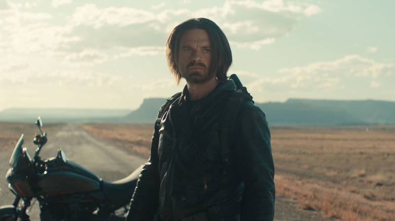 Sebastian Stan's Bucky Barnes standing beside a motorcycle in Marvel's Thunderbolts