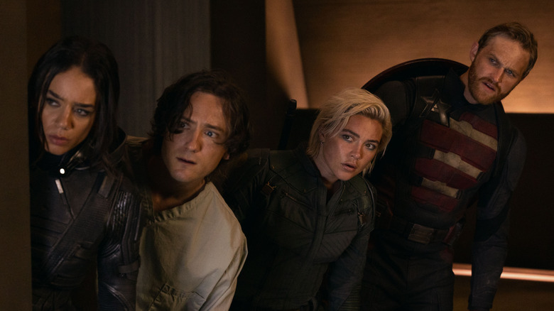 The Thunderbolts looking behind a corner