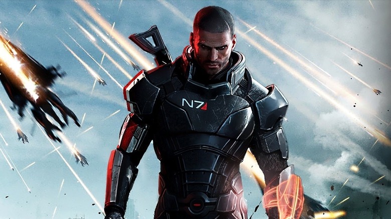 Mark Meer as the voice of Commander Shepard standing in front of Reaper ships crashing to Earth in promo artwork for Mass Effect 3