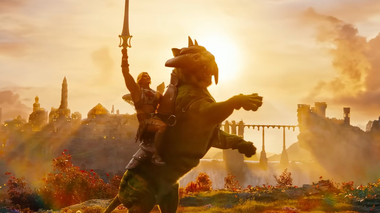 He-Man sholding his sword while riding a creature in Masters of the Universe (2026)