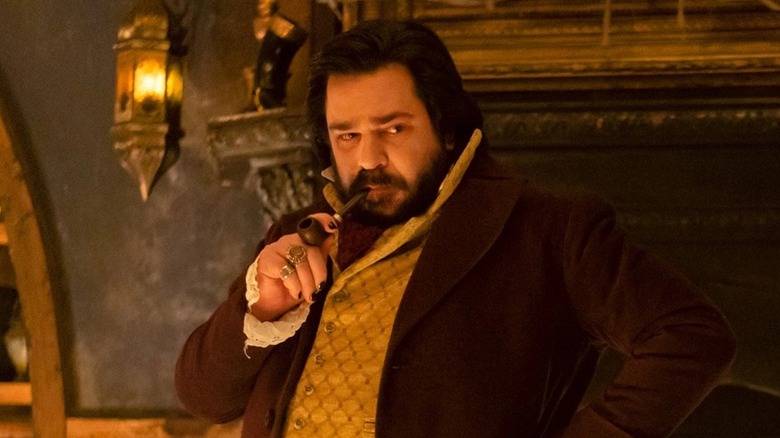 Matt Berry smokes a pipe as Laszlo Cravensworth on What We Do in the Shadows