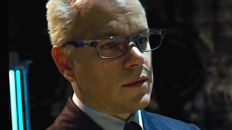 Management looking intense and wearing glasses in The Zero Theorem