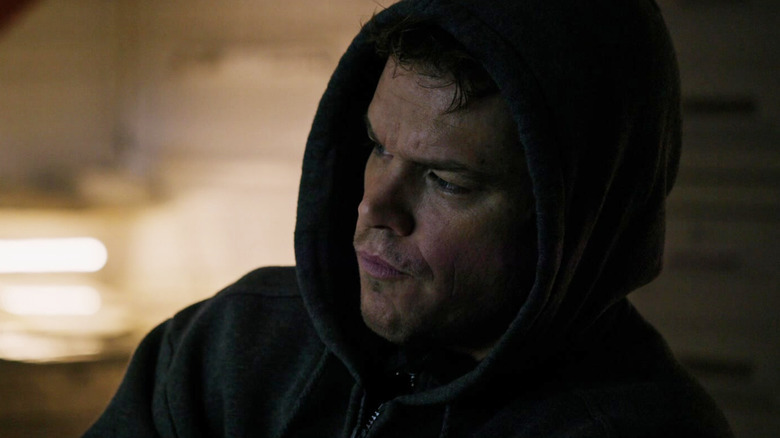 Matt Damon's Mark looking thoughtful in a hoodie in The Martian