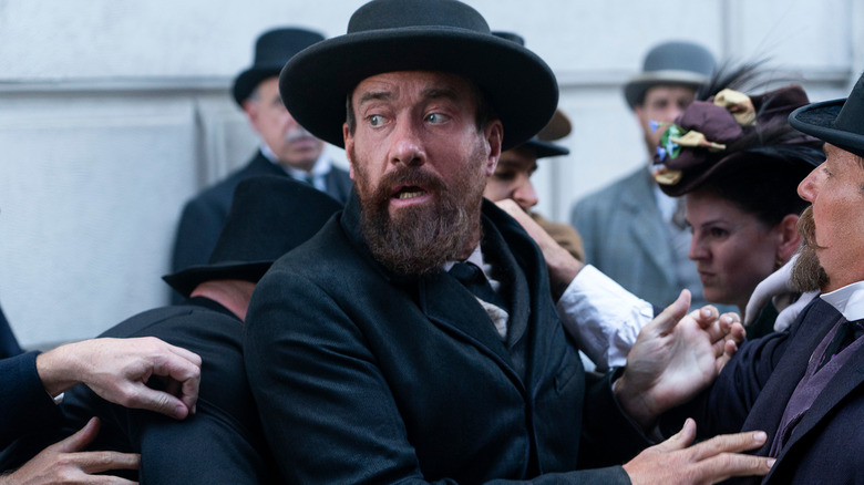 Matthew Macfadyen looks panicked in a hat as Charles Giteau in Death by Lightning