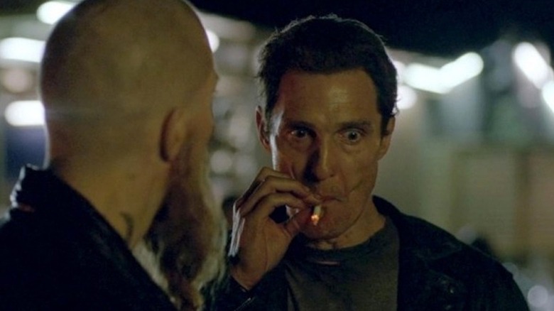 Matthew McConaughey takes the deepest of drags on a cigarette in True Detective
