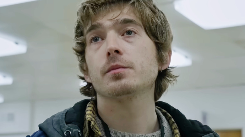 Austin Abrams as Bryan standing in a hospital in Resident Evil (2026)