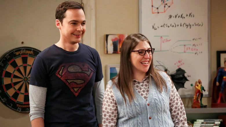 Sheldon Cooper and Amy Farrah Fowler smiling in The Big Bang Theory