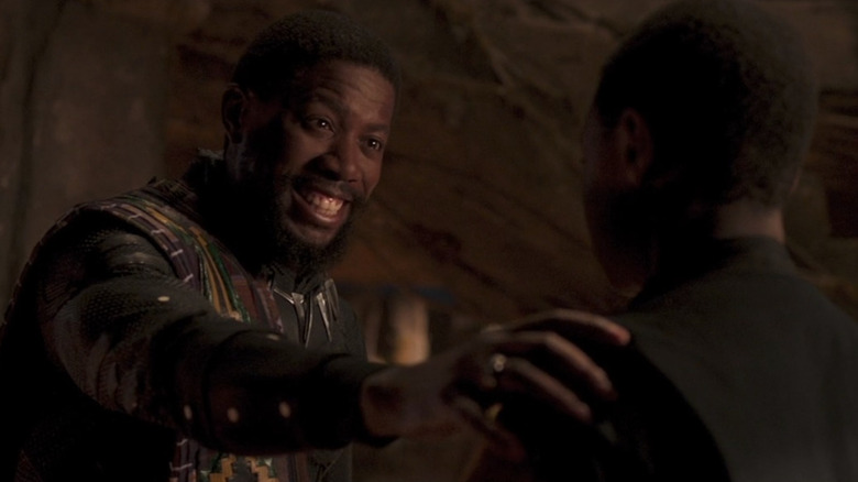 King T'Chaka smiling at young Prince T'Challa