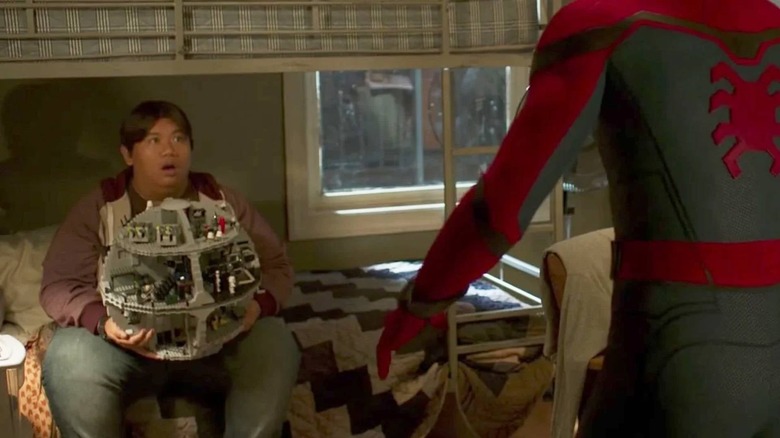 Ned holding LEGO Death Star