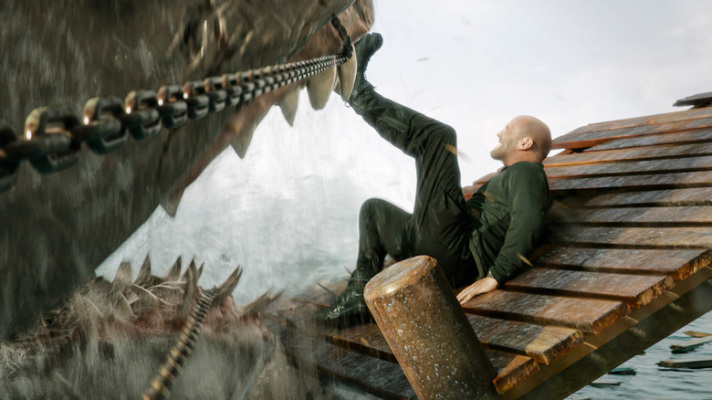 Statham kicking a shark in Meg 2