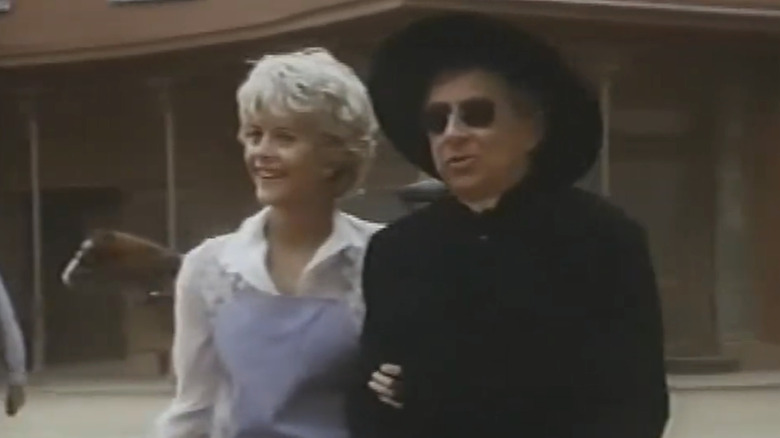 Meg Ryan as perky newspaper editor Cally Oaks helping a preacher in Wildside