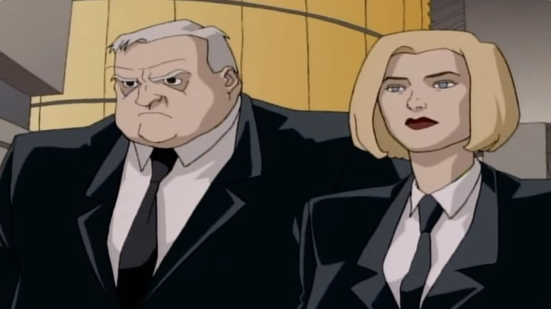 Zed and Agent L standing together in Men in Black: The Series
