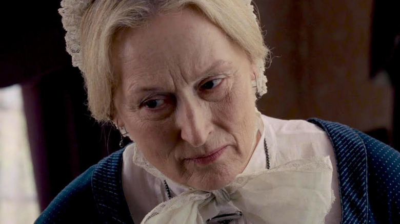 Meryl Streep as Altha Carter looks concerned in The Homesman